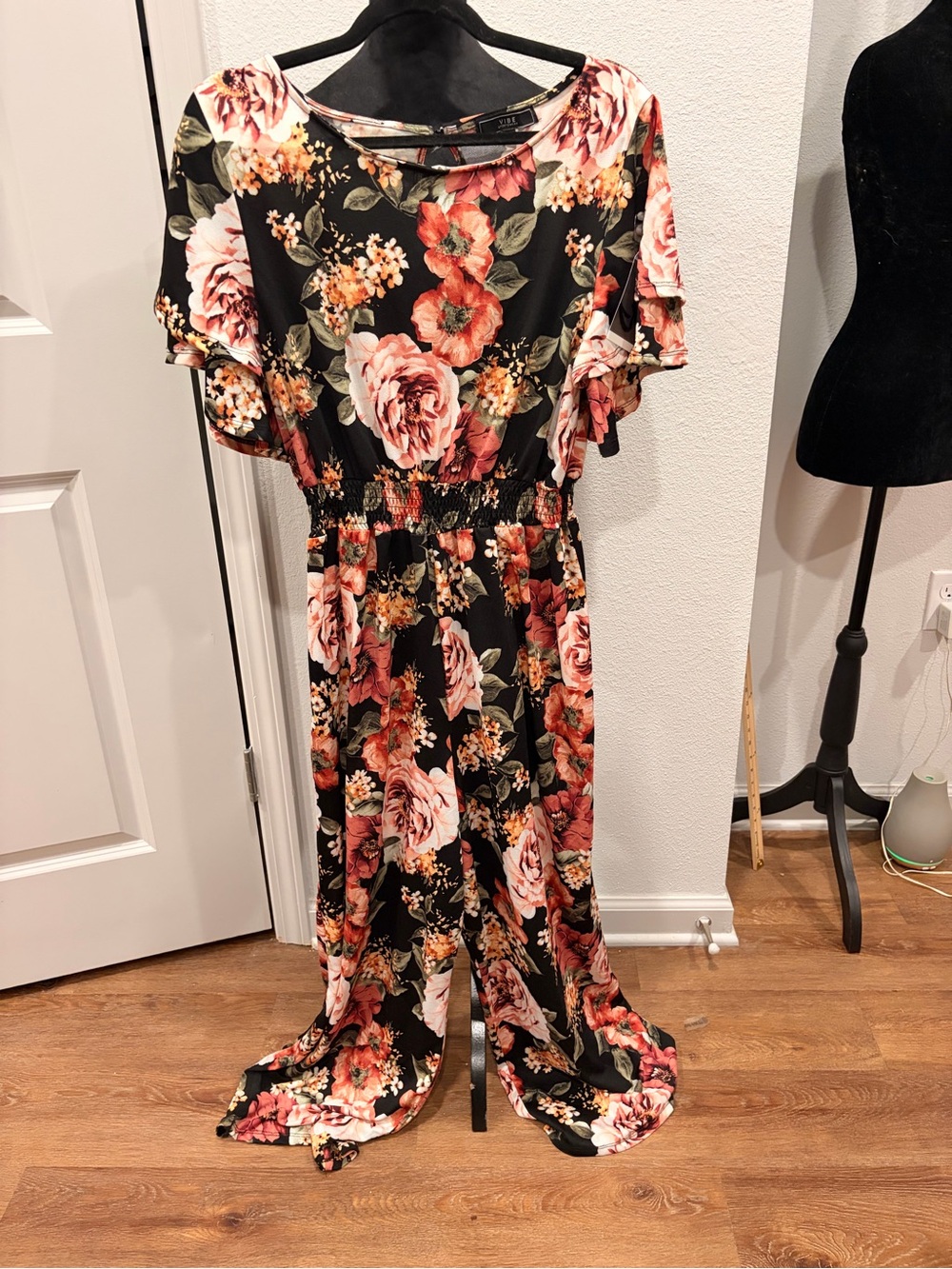 Women’s 1X black and floral jumpsuit
